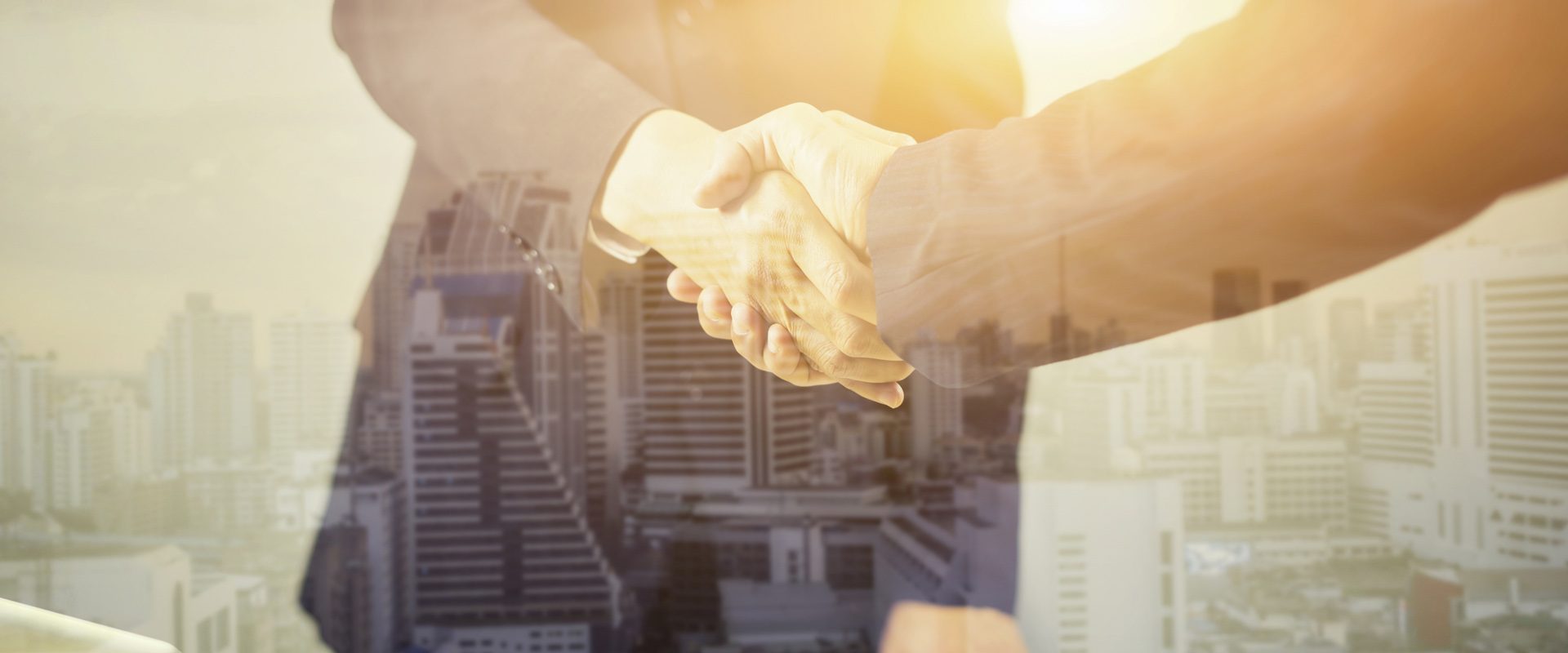 Double exposure of Great job,Sealing a deal,Successful business,Handshake,Businessman join together,Good agreement.two people shaking hands standing at the working place in city scape