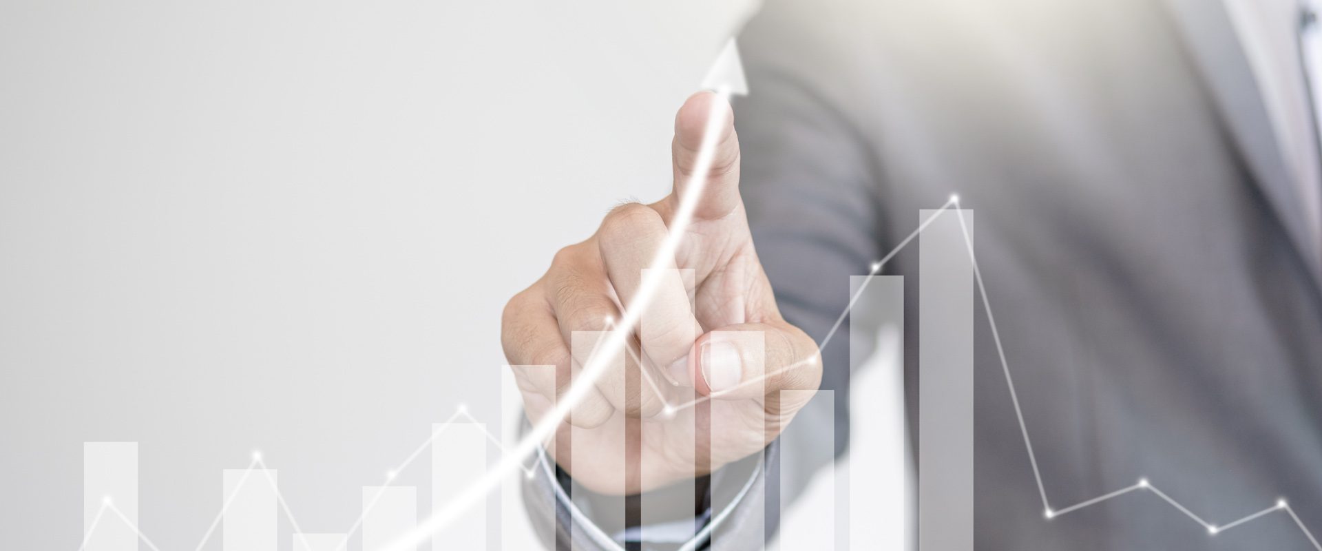 Fund manager hand writing increasing graph to screen monitor. Investment and analysis stock concept.